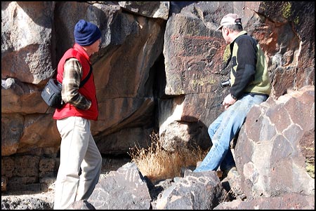 Jim and Martin view damage caused by someone trying to make a mold of a bighorn sheep.