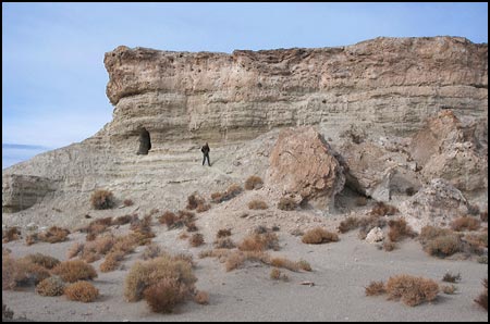 A cave in a high cliff